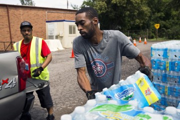 Flint water crisis: expert says lead levels normal but warns against celebration